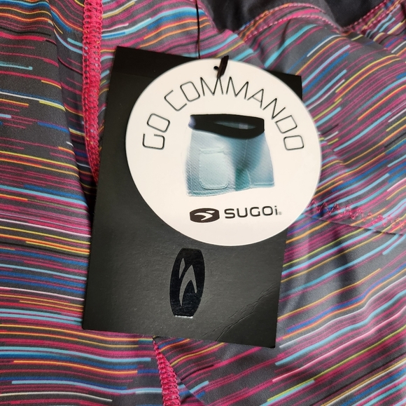 SUGOI FUSION SKORT NWT XS, gray with multi color stripes and hot pink tr… - Picture 4 of 7